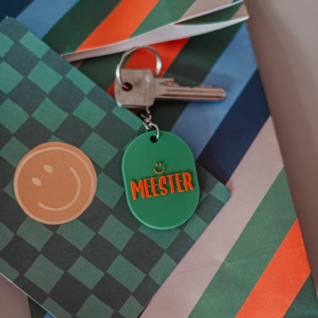 Sleutelhanger ovaal 50x36mm - Meester