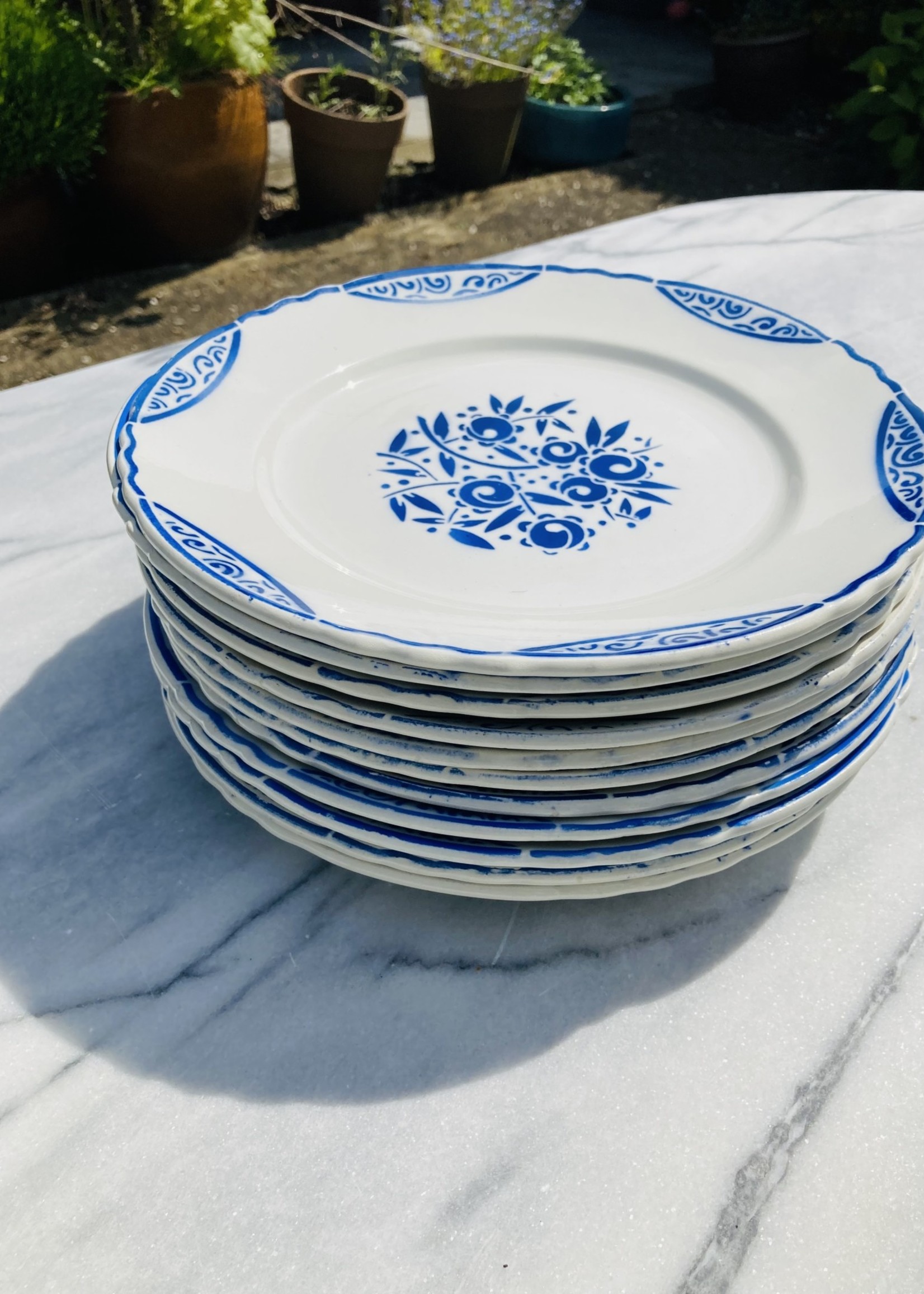 Large porcerame  plate with blue grape decor and lines on border from Francois