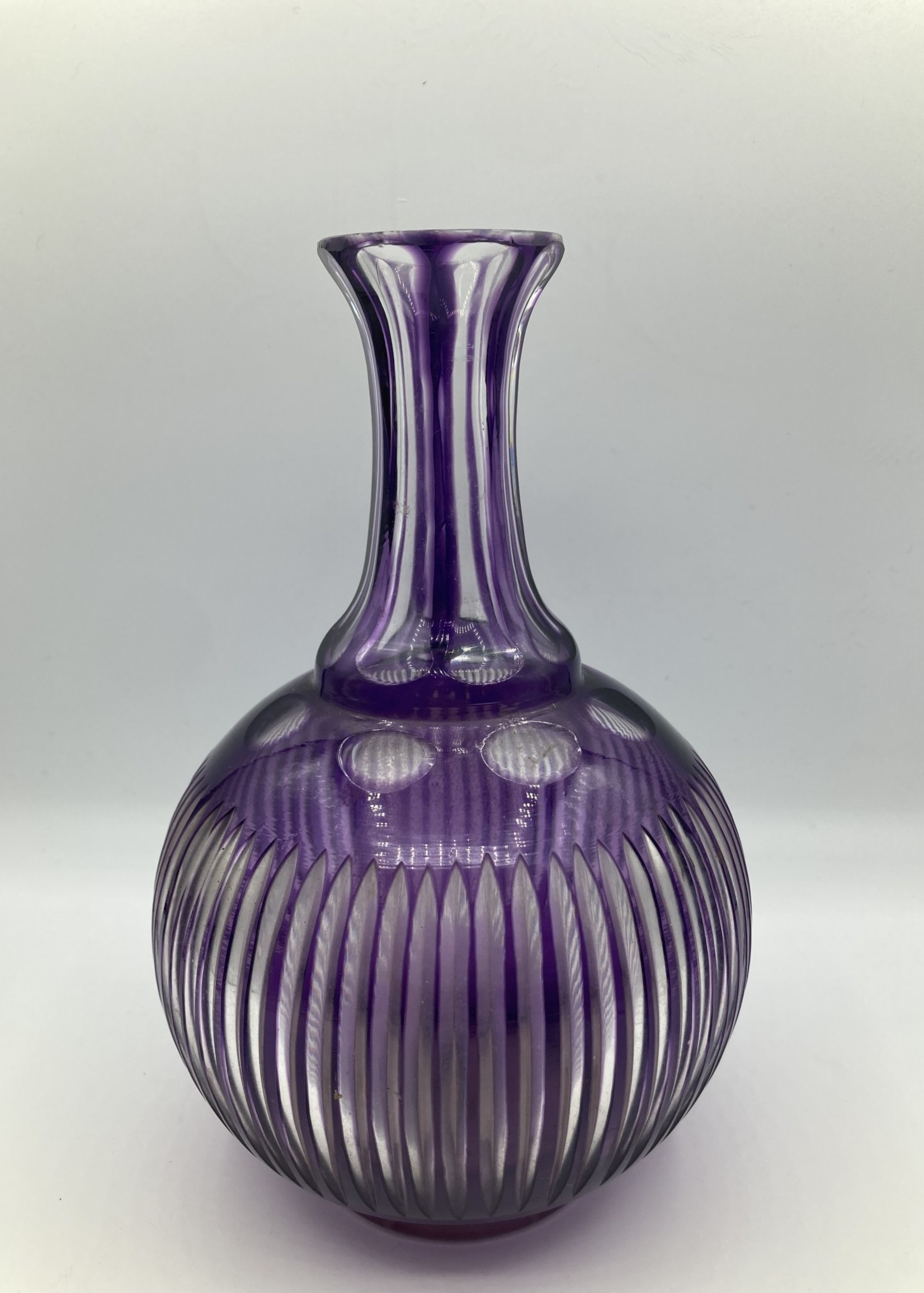 Purple glass carved vase