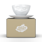 Kaffee-Tasse & Unterteller "Grinsend", Hartporzellan, weiß Kaffee-Tasse & Unterteller "Grinsend", Hartporzellan, weiß