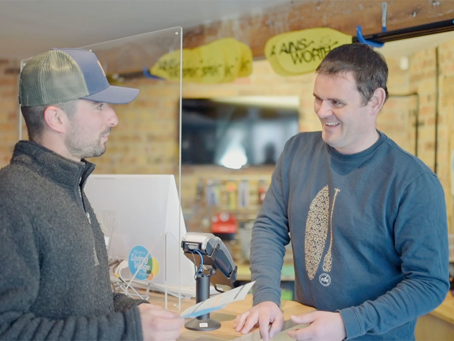 Simon giving advice on watersport equipment