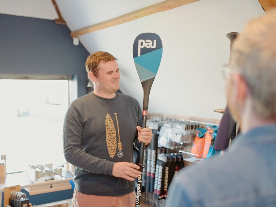 Advising customer in Cullercoats shop