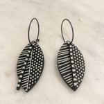 Black Leaf with White Stripes and Spots Abstract Earrings