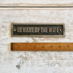 IRON RANGE Plaque BEWARE OF THE WIFE Cast Ant iron 42mm x 163mm