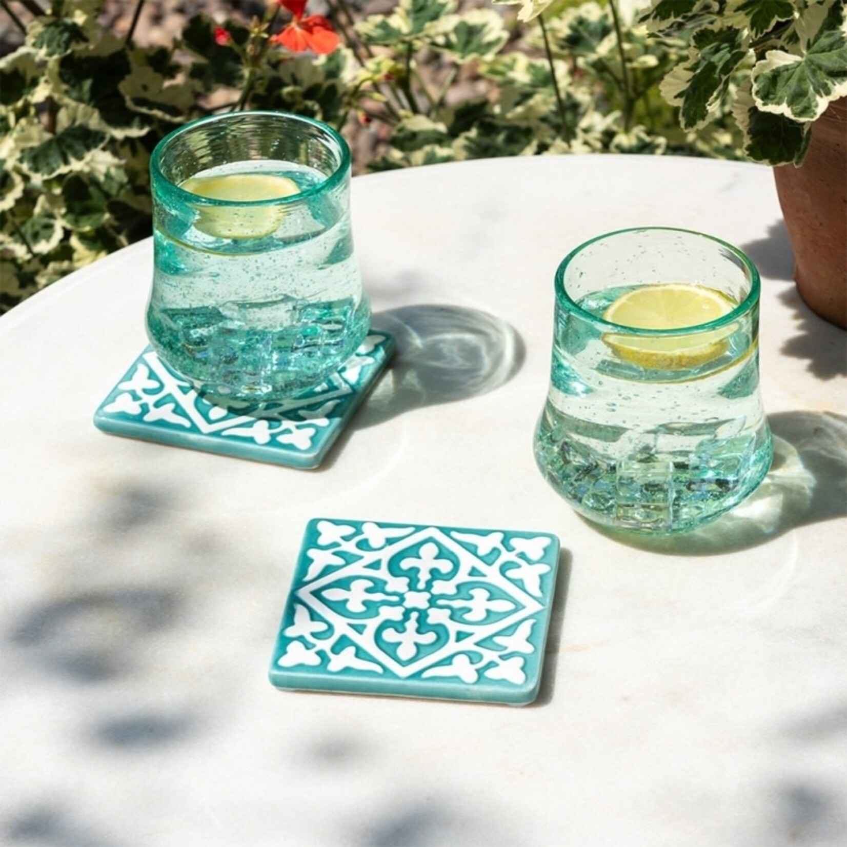 Two Turquoise and white Embossed Ceramic tile coasters