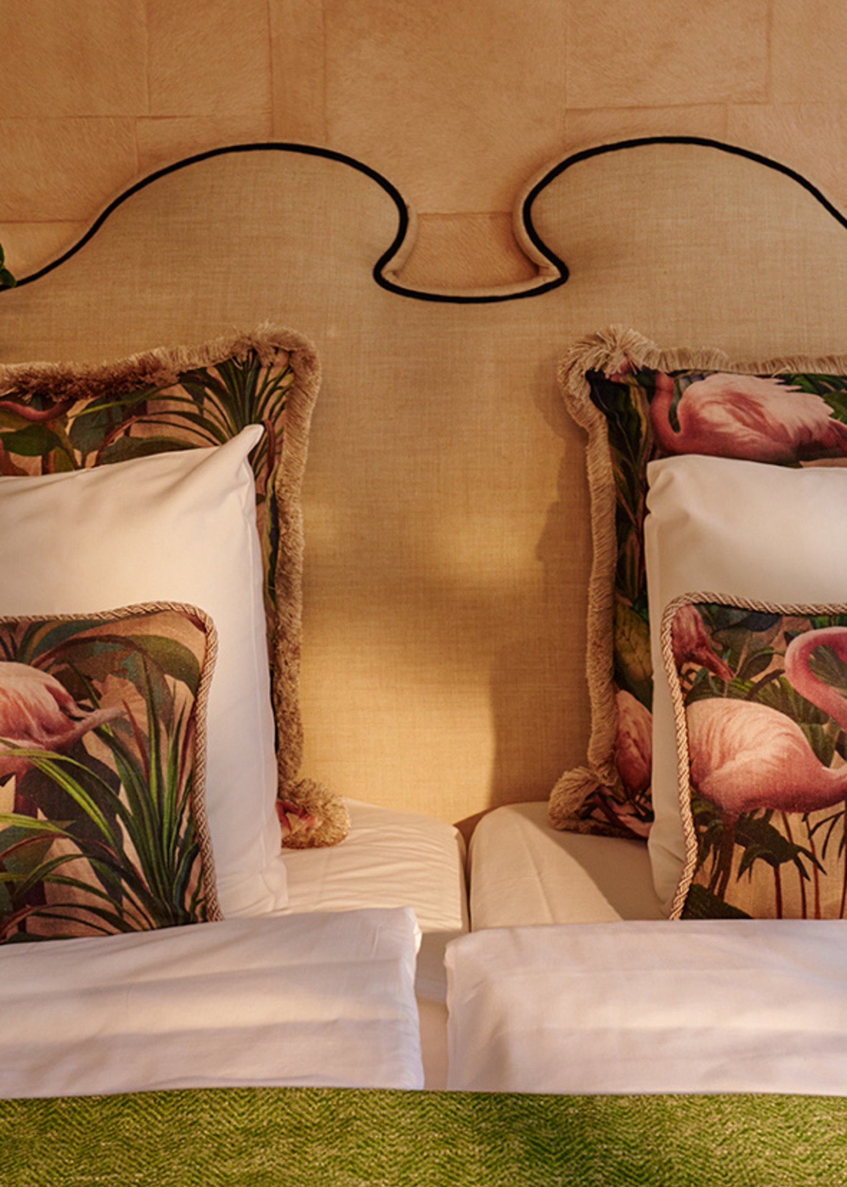 Esther's Flamingo Room's pillows, gold plush