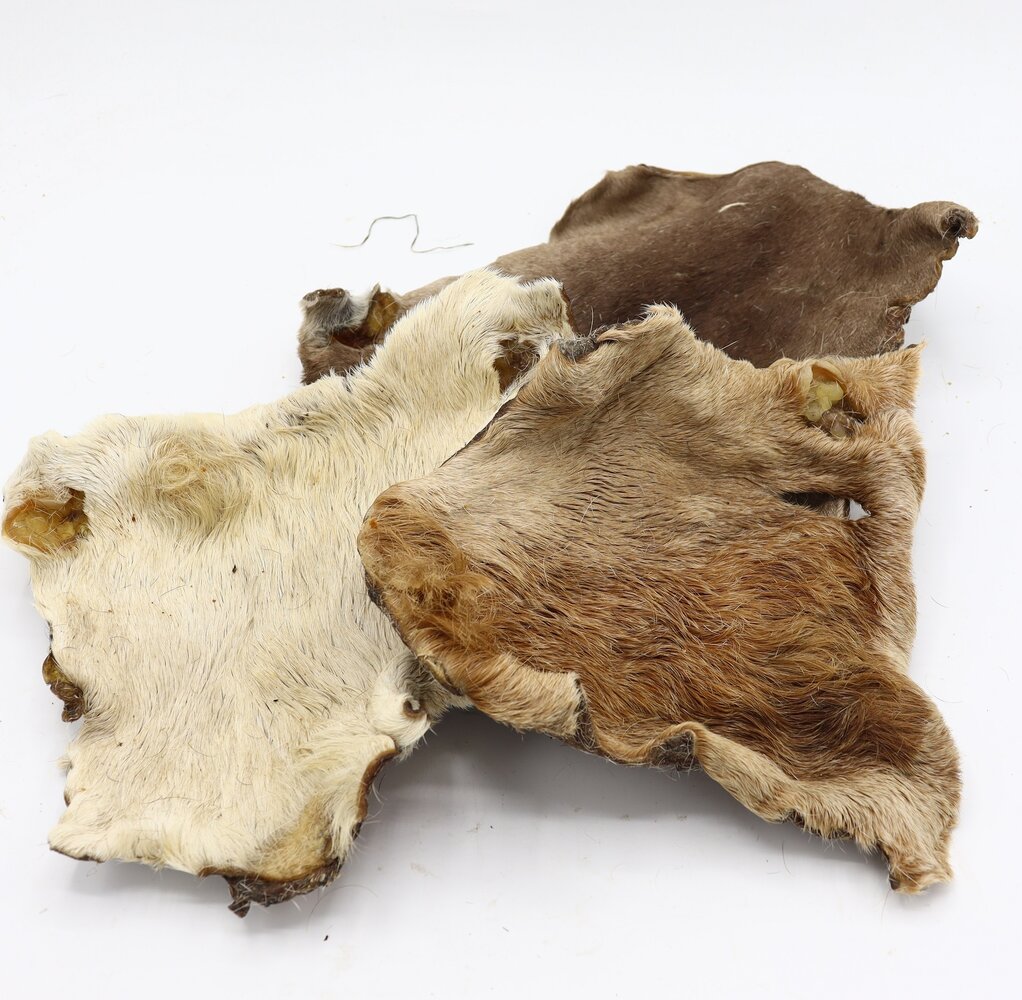 Bark-Bite Bark-Bite Runderhuid met vacht - 1 kilo Bark-Bite Bark-Bite Runderhuid met vacht - 1 kilo