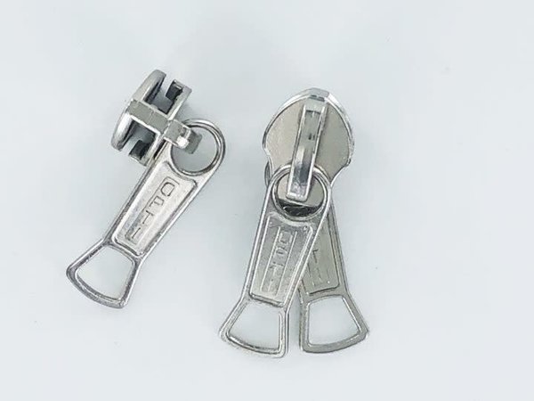 Optilon Optilon | Runner / Schuiver | voor 10 mm Spiraalrits | RT25 | 2 grijpplaten | Koper-Vernikkeld Optilon Optilon | Runner / Schuiver | voor 10 mm Spiraalrits | RT25 | 2 grijpplaten | Koper-Vernikkeld