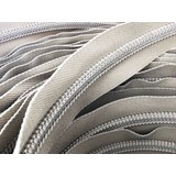 Optilon Optilon | Rits Spiraal | Op Rol | RT25 | 10 mm | Beige | Prijs per meter Optilon Optilon | Rits Spiraal | Op Rol | RT25 | 10 mm | Beige | Prijs per meter