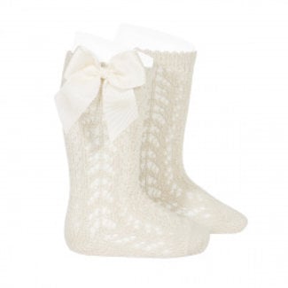 Cóndor Beige kniekous van Cóndor met visgraatpatroon en strikje.