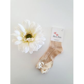 Meia Pata Gouden kniekous van Meia Pata met strik.