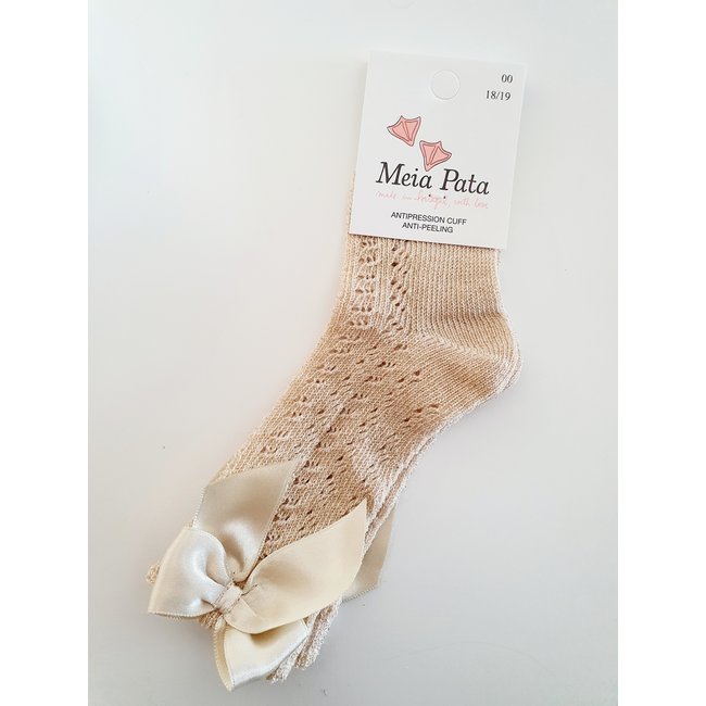 Meia Pata Gouden kniekous van Meia Pata met strik.