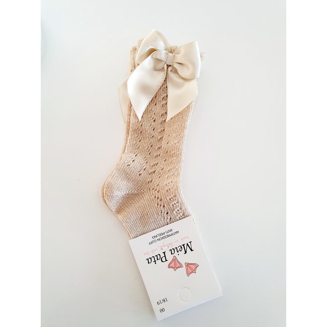 Meia Pata Gouden kniekous van Meia Pata met strik.