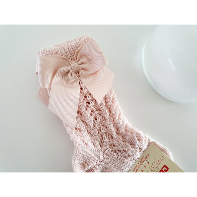 Cóndor Nude kniekous met visgraatpatroon en strikje.