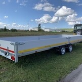 Geremde Eduard multitransporter - 606x220 cm - 3500 kg bruto laadvermogen - 63 cm laadvloerhoogte - 30 cm borden - inclusief oprijplaten