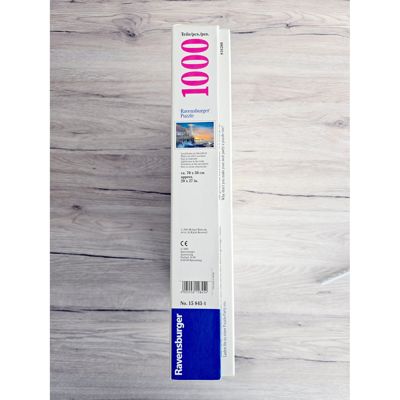 Ravensburger Puzzle  - Phare au soleil couchant