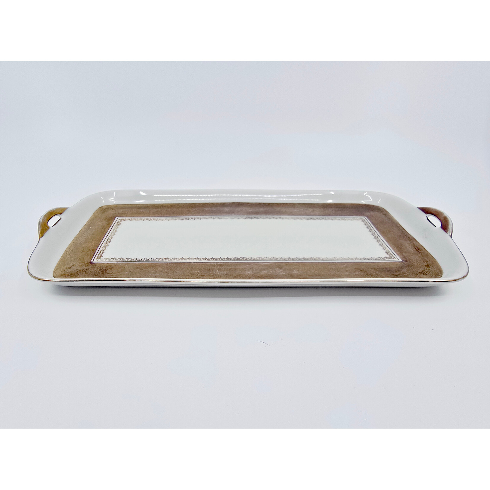 Plat à cake ancien en porcelaine