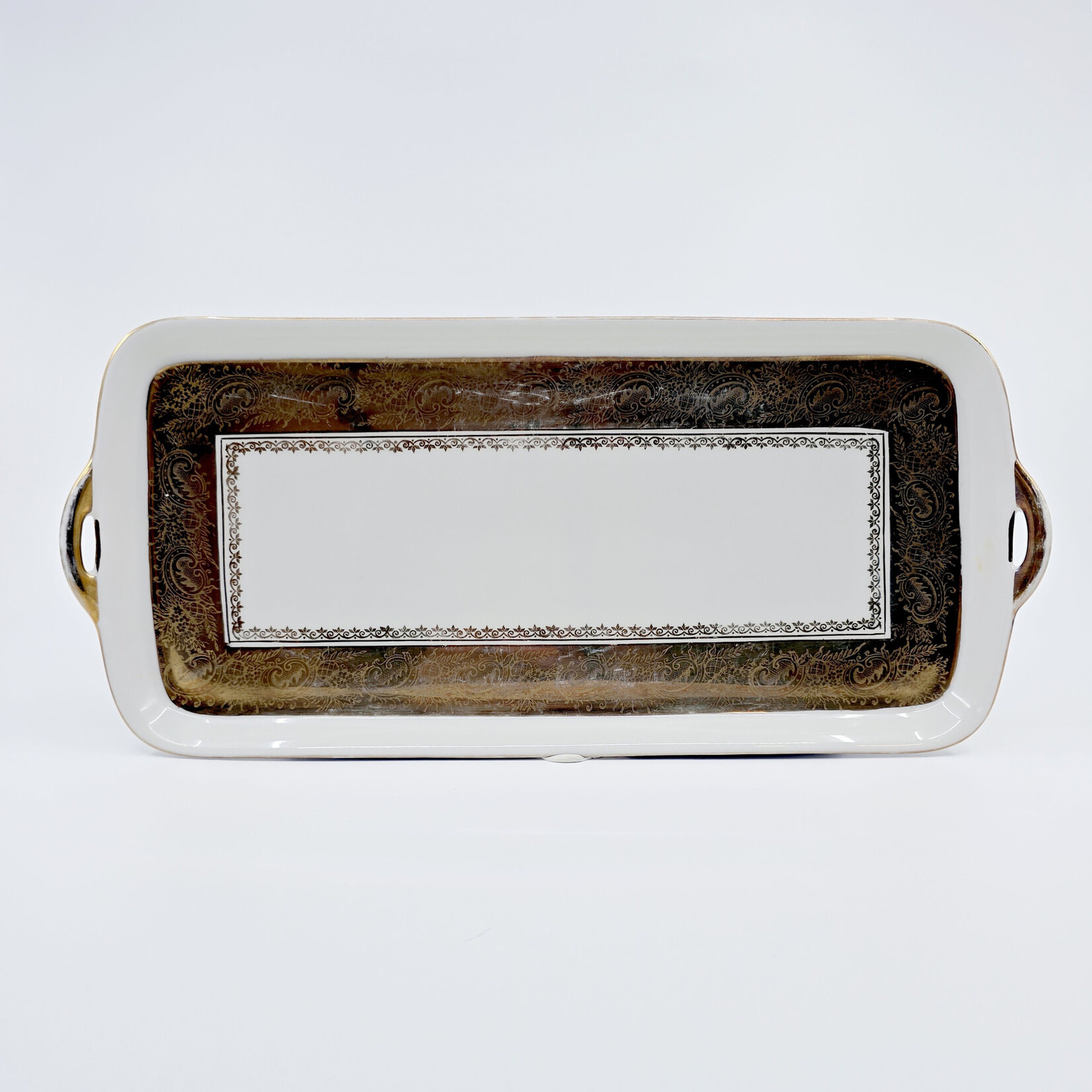 Plat à cake ancien en porcelaine