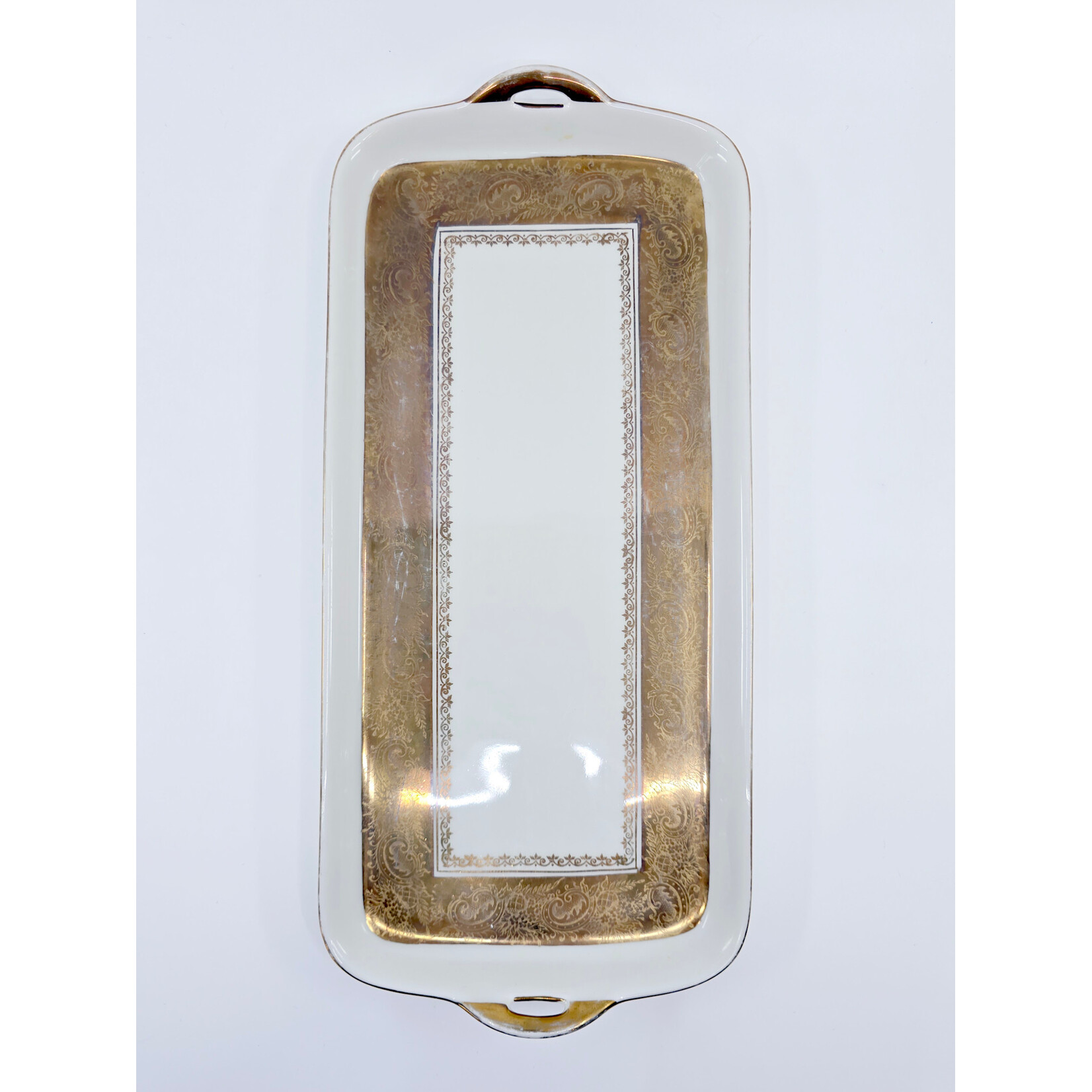 Plat à cake ancien en porcelaine