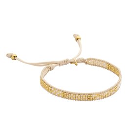 Biba Breed armbandje met kralen - beige/goud/wit