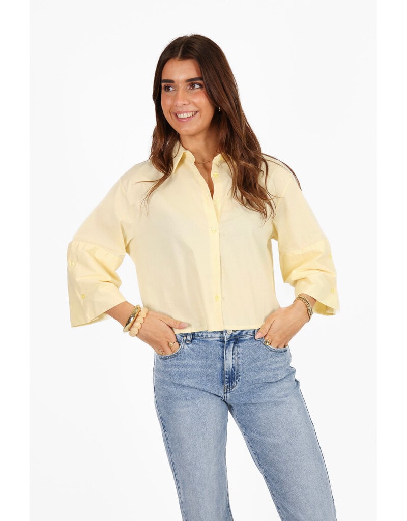 Effen blousje met uitlopende mouwen - lichtgeel