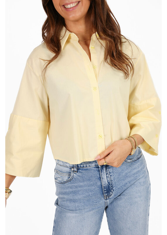 Effen blousje met uitlopende mouwen - lichtgeel