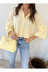 Effen blousje met uitlopende mouwen - lichtgeel