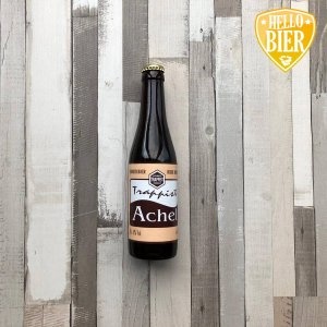 Achel Trappist Bruin  Herkomst: Achel, België  Kastanjebruin trappistenbier met stevige schuimkraag. Warm mondgevoel met rood fruit en licht metalig. Niet te zoet door het rode fruit en het bier wordt afgesloten met een droge afdronk. Achel Trappist Bruin is afkomstig van brouwerij…. Een trappistbier wat je herkent aan het logo op het etiket waarop staat “authentic trappist product”. Dat is één van de kenmerken van een Trappistenbier.