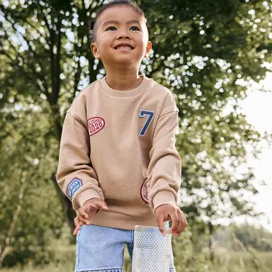 Trui Badges oversized (latte sand)