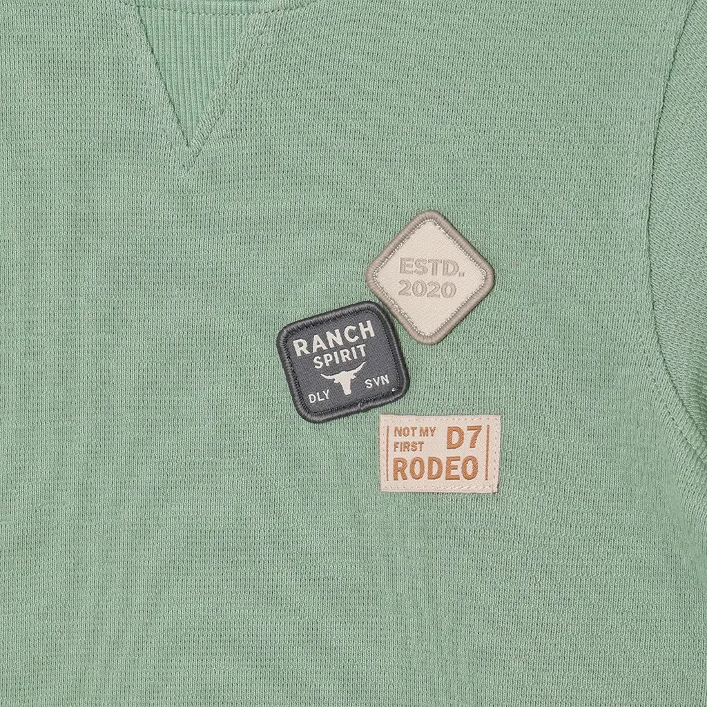 T-shirt Badge (green milieu)