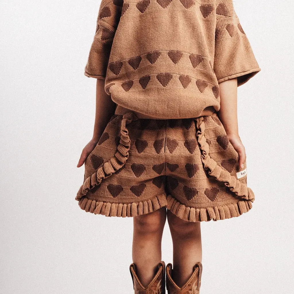 Gebreid kort broekje Casares (peach almond)