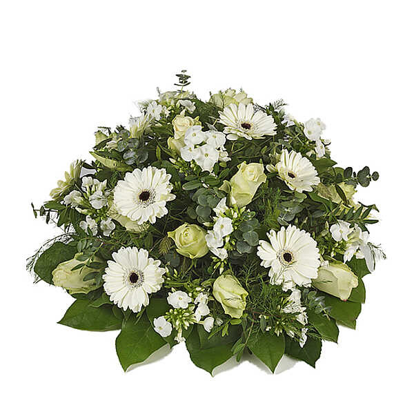 Witte rouwbloemen in een rouwbloemstuk