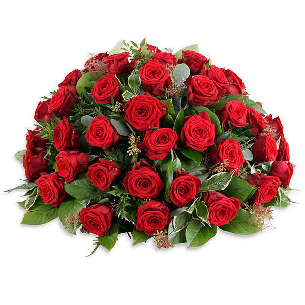 Rode rouwbloemen in een rouwbloemstuk