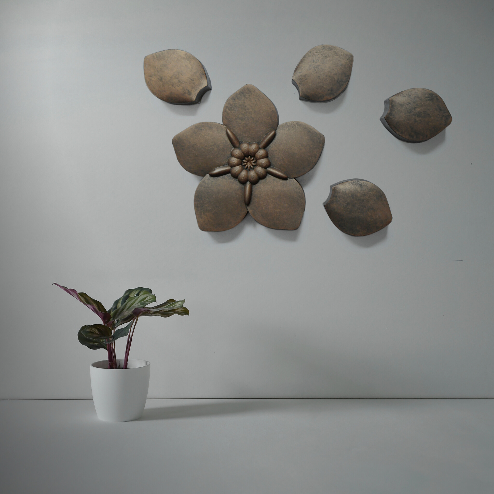 Urn / Asbeeld Losse blaadjes voor Vergeet ons niet - Brons