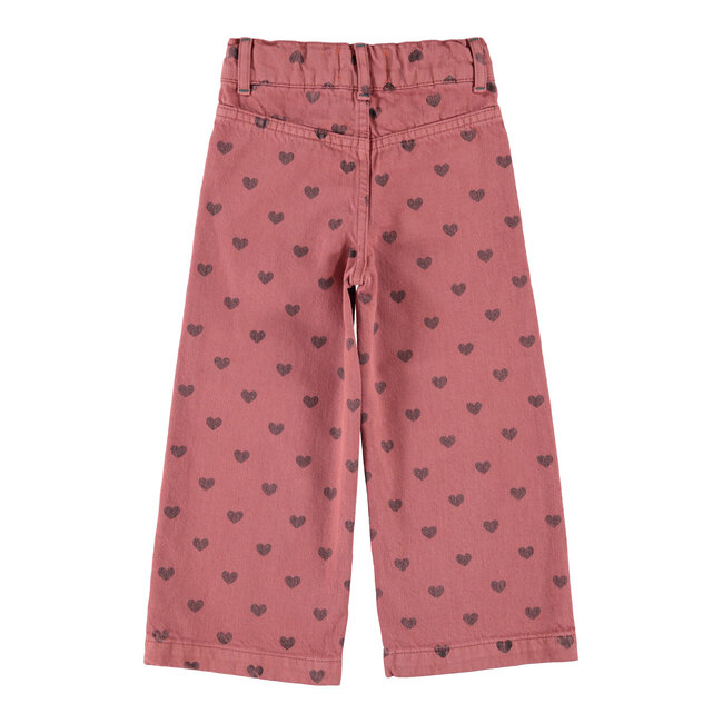 Piupiuchick flare trousers | pink w/ black hearts