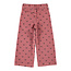 Piupiuchick flare trousers | pink w/ black hearts