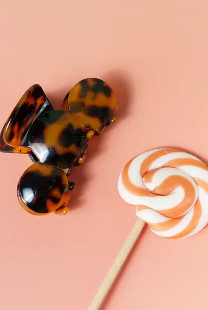 Nomi (clip) - Marmer Bruin