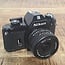 Nikon EM + 28mm 1:2.8 nr. 2369