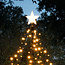 Outdoor Christmas tree lighting with flagpole and Christmas star