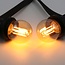 Set of festoon lights with 2.5W or 4.5W filament bulbs, 2000K, Ø45, amber glass - dimmable option
