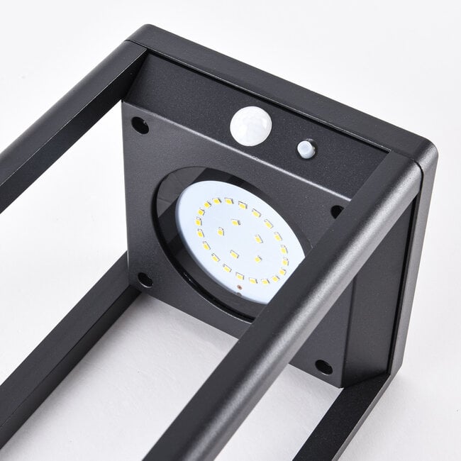 Black freestanding outdoor light with solar power and sensor – Marcello