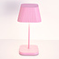 Rechargeable table lamp Tessa in matte pink, dimmable