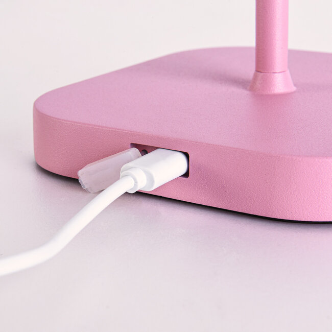 Rechargeable table lamp Tessa in matte pink, dimmable