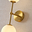 Modern wall light Runda, 2-bulb - gold