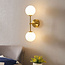 Modern wall light Runda, 2-bulb - gold