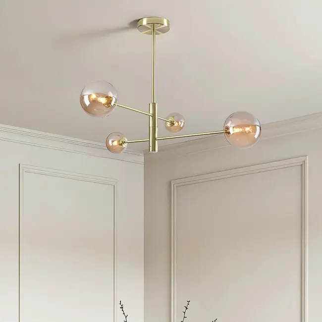 Designer ceiling light Stiri gold with amber glass, 4-bulb