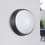 Round outdoor wall light with adjustable colour temperature - black