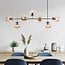 Designer pendant light Hepta with 7 amber glass globes