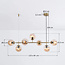 Designer pendant light Hepta with amber glass spheres