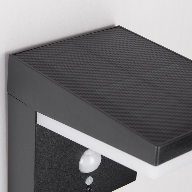Modern solar wall lamp black with sensor - Halo